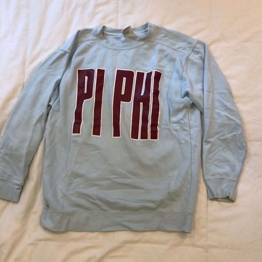 Light blue Pi Phi sweatshirt w/ dark red letters